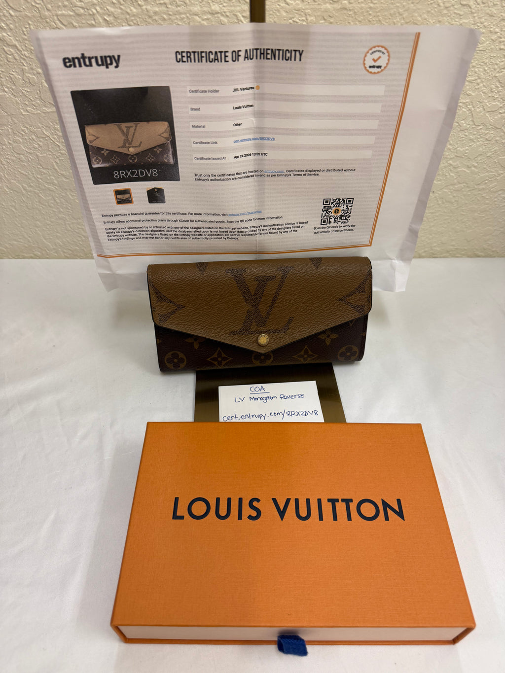 Luis Vuitton reverse monogram Sarah Wallet