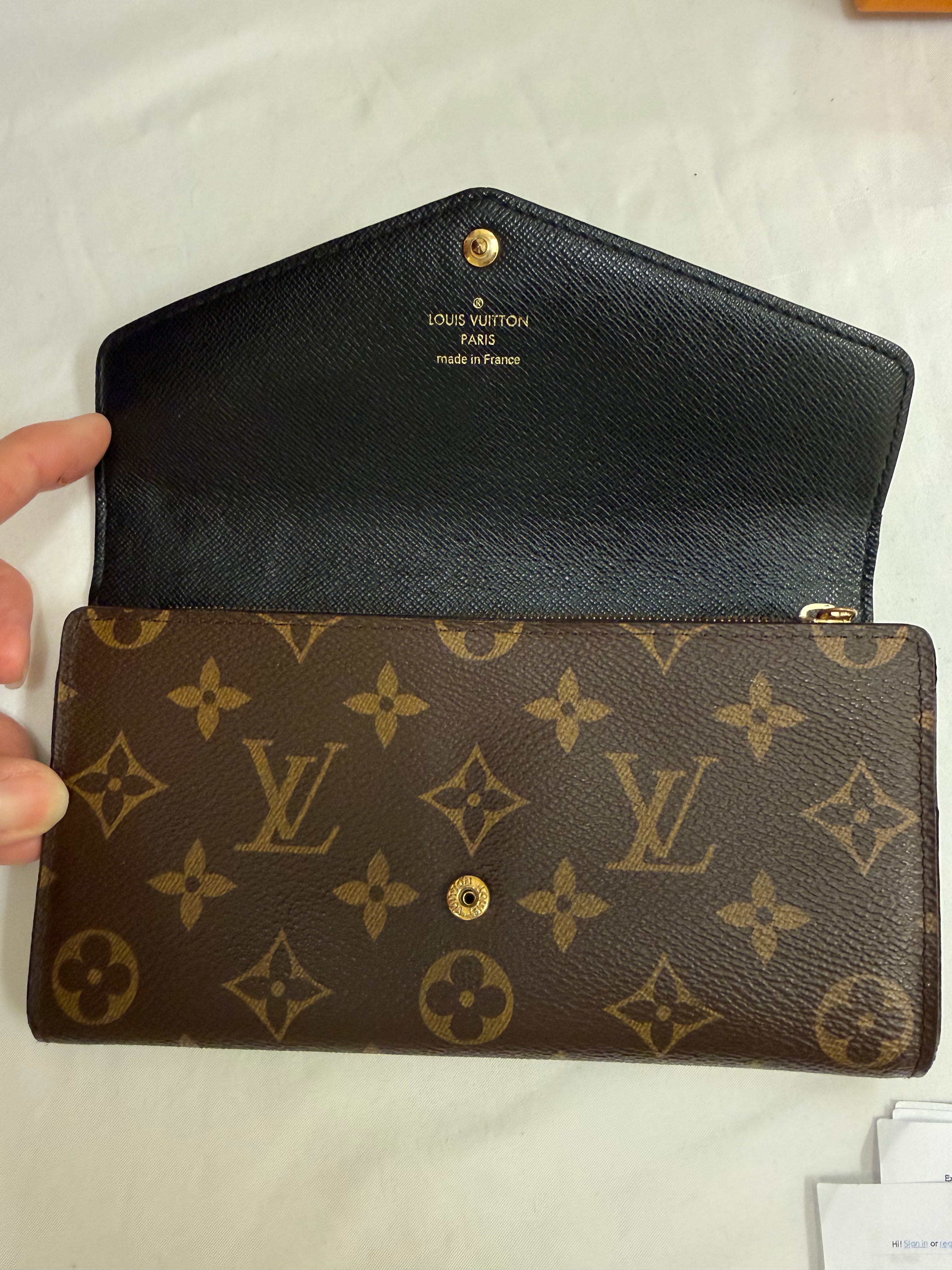 Luis Vuitton reverse monogram Sarah Wallet