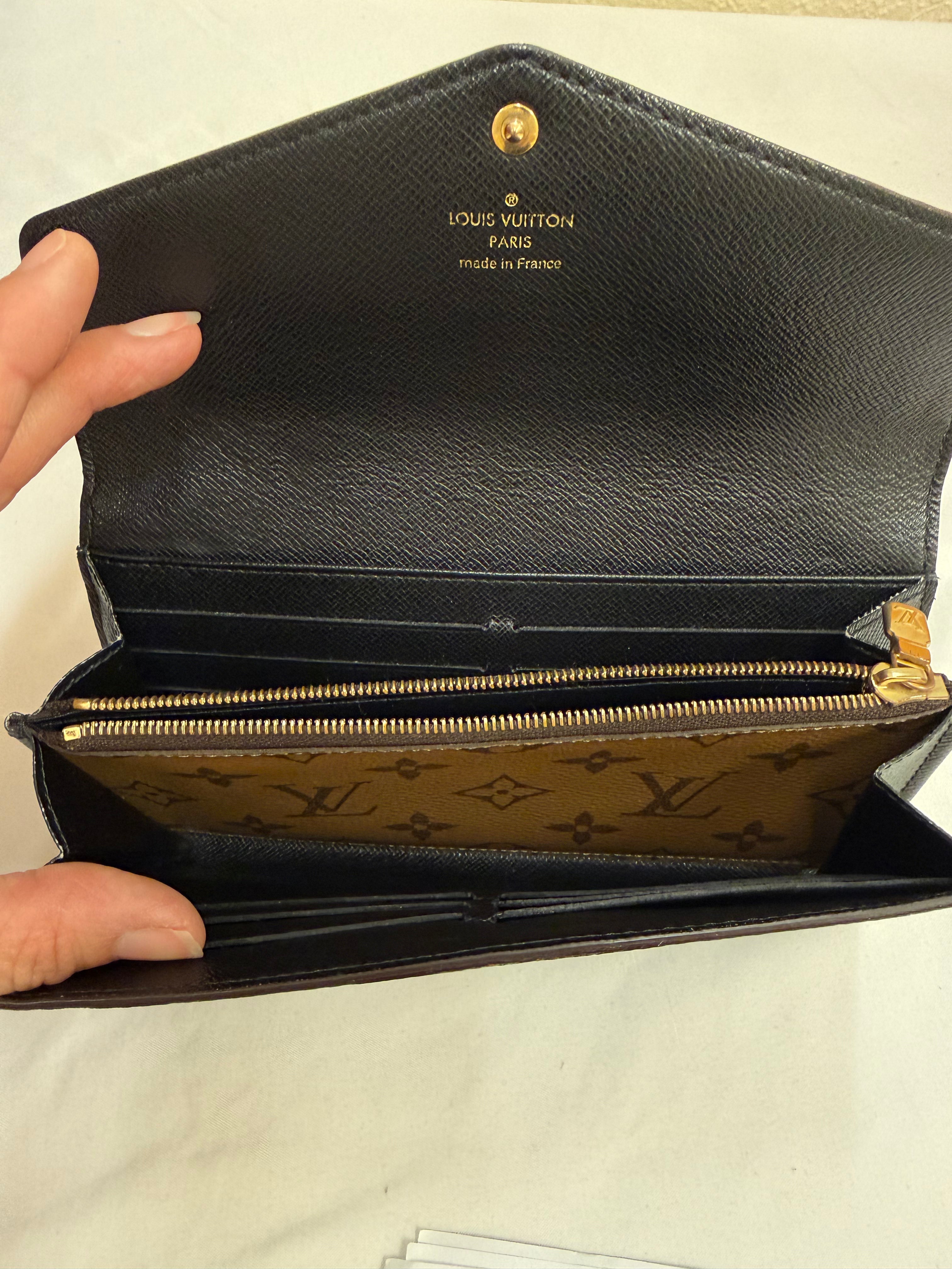 Luis Vuitton reverse monogram Sarah Wallet